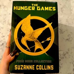 All 4 Hunger Games Books by Suzanne Collin’s.
